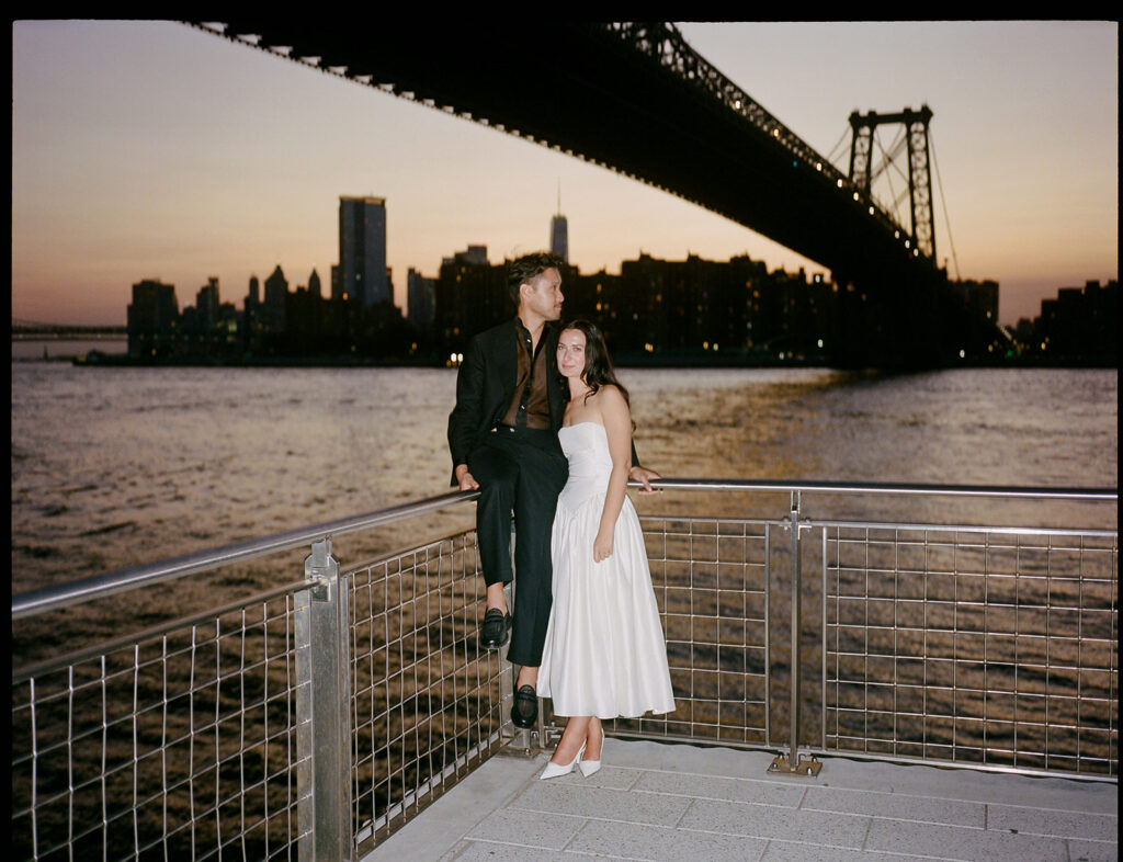 Wedding portraits with the Manhattan skyline after their elopement.