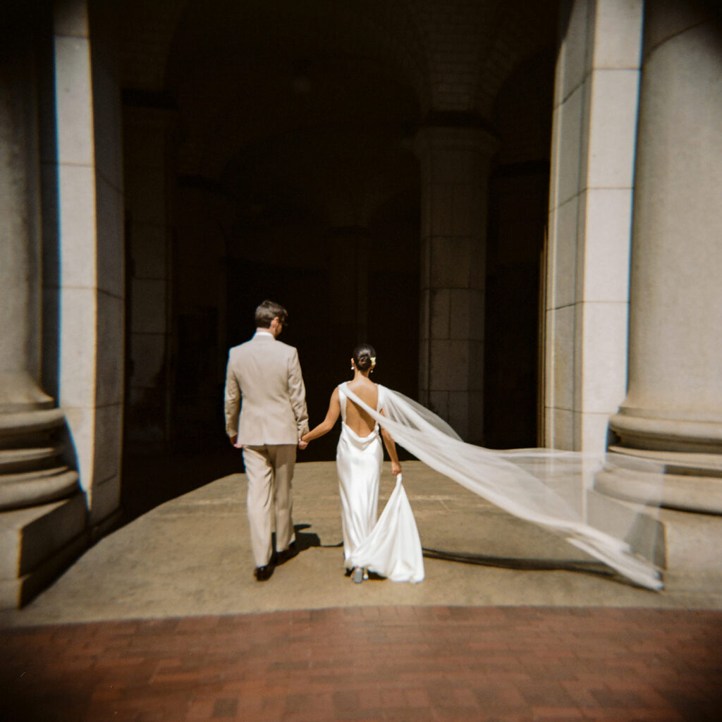 Danielle Frankel wedding dress worn during a fashion-forward wedding captured by Blake Nelson.
