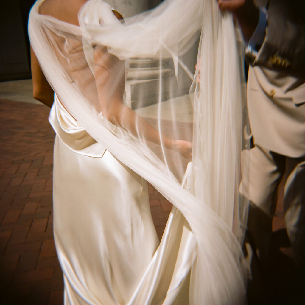 Danielle Frankel wedding dress worn during a fashion-forward wedding captured by Blake Nelson.