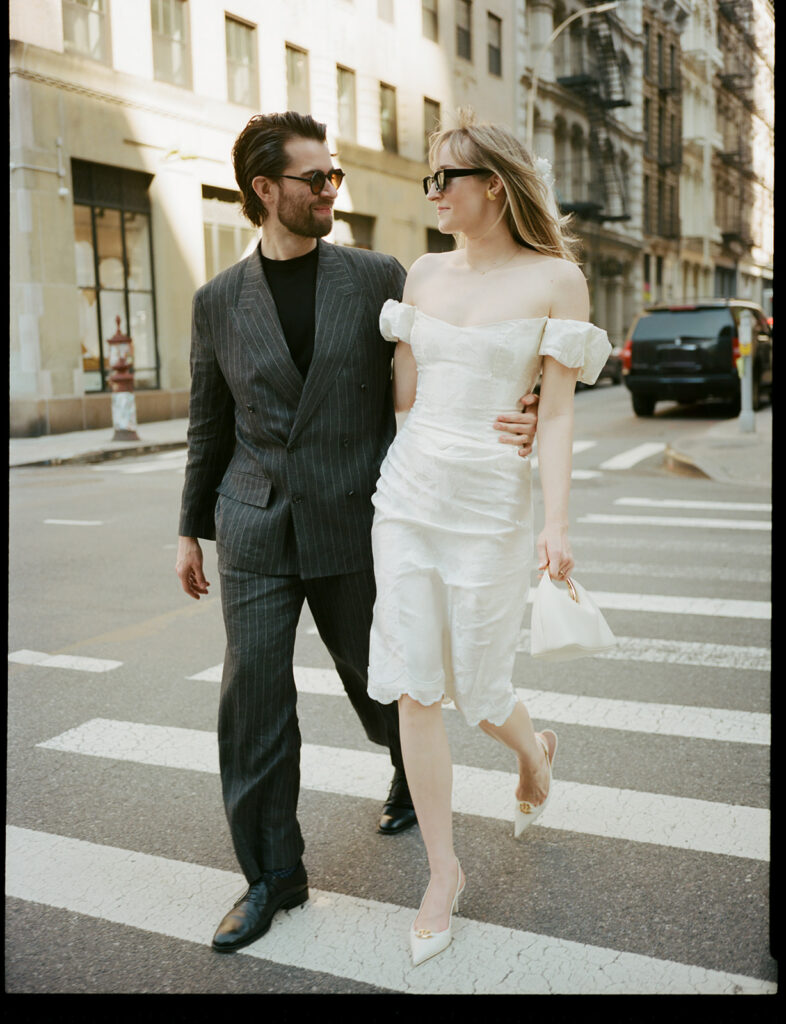 NYC street portraits of a wedding couple.