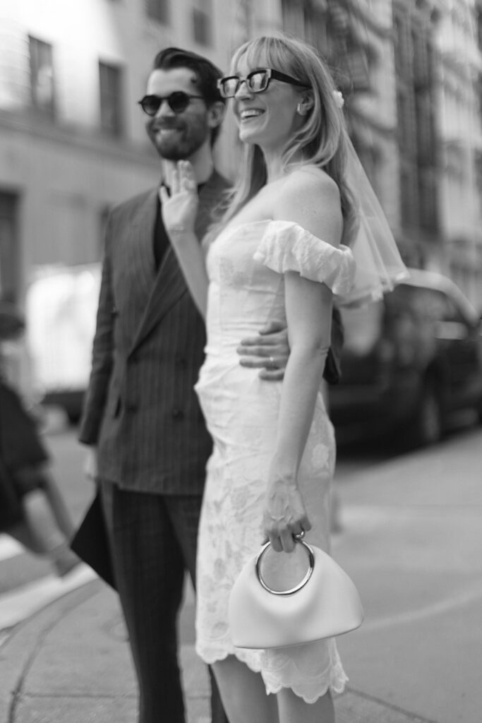 NYC street portraits of a wedding couple.
