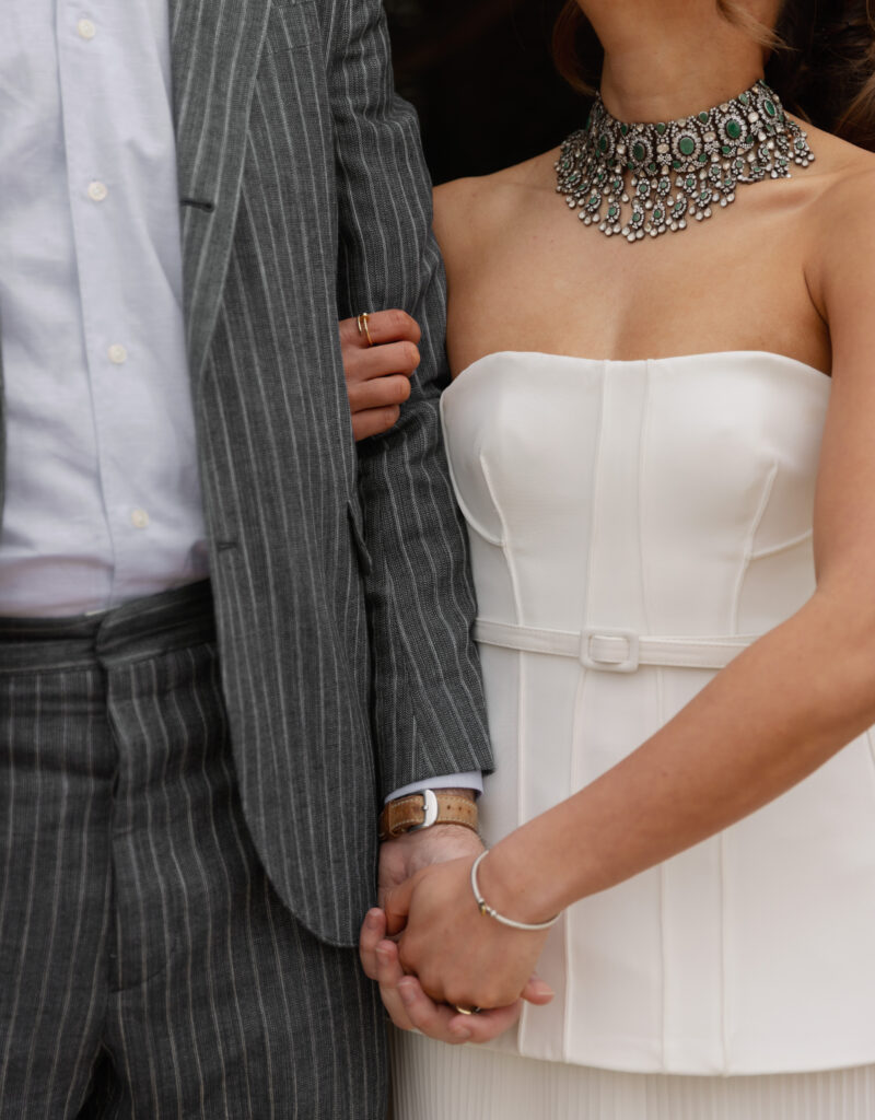 Kismet and Paul share a sweet moment during their Napa Valley welcome dinner before their wedding.