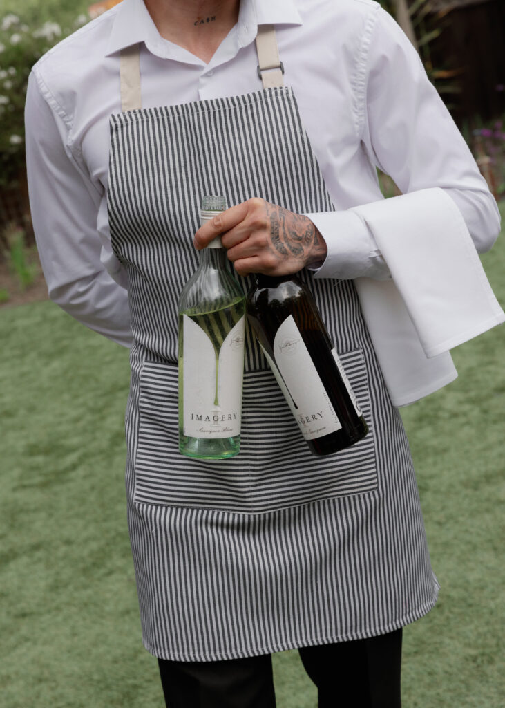 Wine poured at Napa Valley Indian wedding rehearsal.