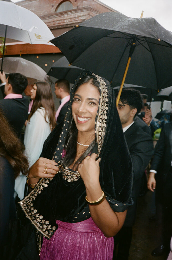 Wedding guests celebrate together after the wedding ceremony.