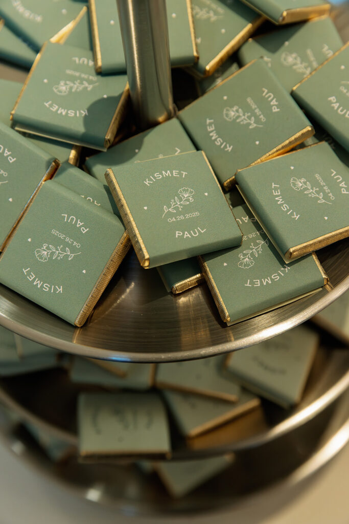Custom chocolates for guests at the wedding reception as part of the decor. 