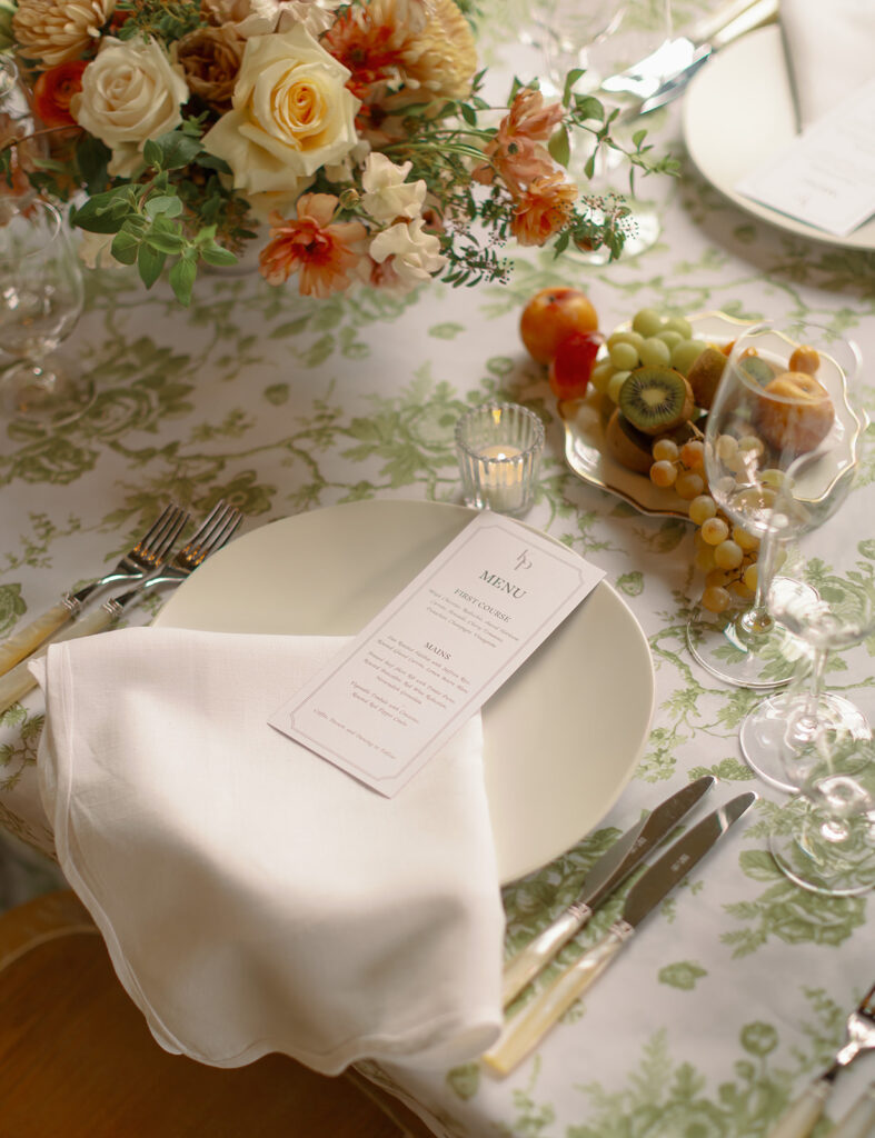 Florals and garden inspired decor of the wedding reception tables. 