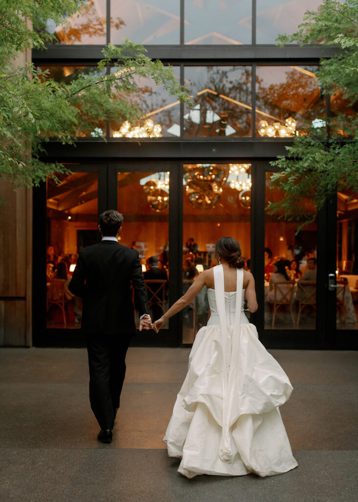 Kismet and Paul entered the reception hand in hand. 